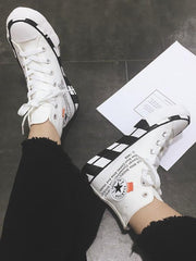 Zapatillas de lona de caña alta de moda