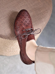 Zapatos planos de cuero huecos literarios