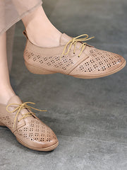 Zapatos planos de cuero huecos literarios