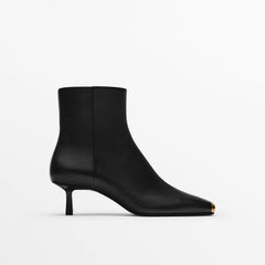 Botines elegantes tipo guante con tacón de 50 mm y cremallera lateral