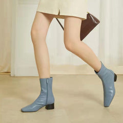 Klassische, elegante, handschuhähnliche Stiefeletten mit mittelhohem Absatz und seitlichem Reißverschluss