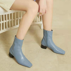 Klassische, elegante, handschuhähnliche Stiefeletten mit mittelhohem Absatz und seitlichem Reißverschluss