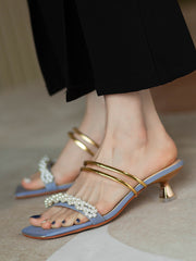 Sandalias elegantes de tacón medio