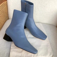 Klassische, elegante, handschuhähnliche Stiefeletten mit mittelhohem Absatz und seitlichem Reißverschluss