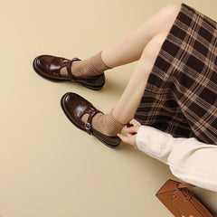 Handgemachte Mary Jane Schuhe mit T-Riemen und runder Spitze, Braun/Schwarz