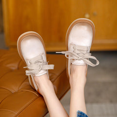 Handgefertigte Oxfords und Flats aus Vollnarbenleder