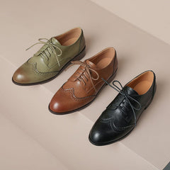 Zapatos Oxford con cordones y punta de ala hechos a mano