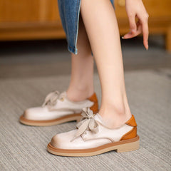 Handgefertigte Oxfords und Flats aus Vollnarbenleder