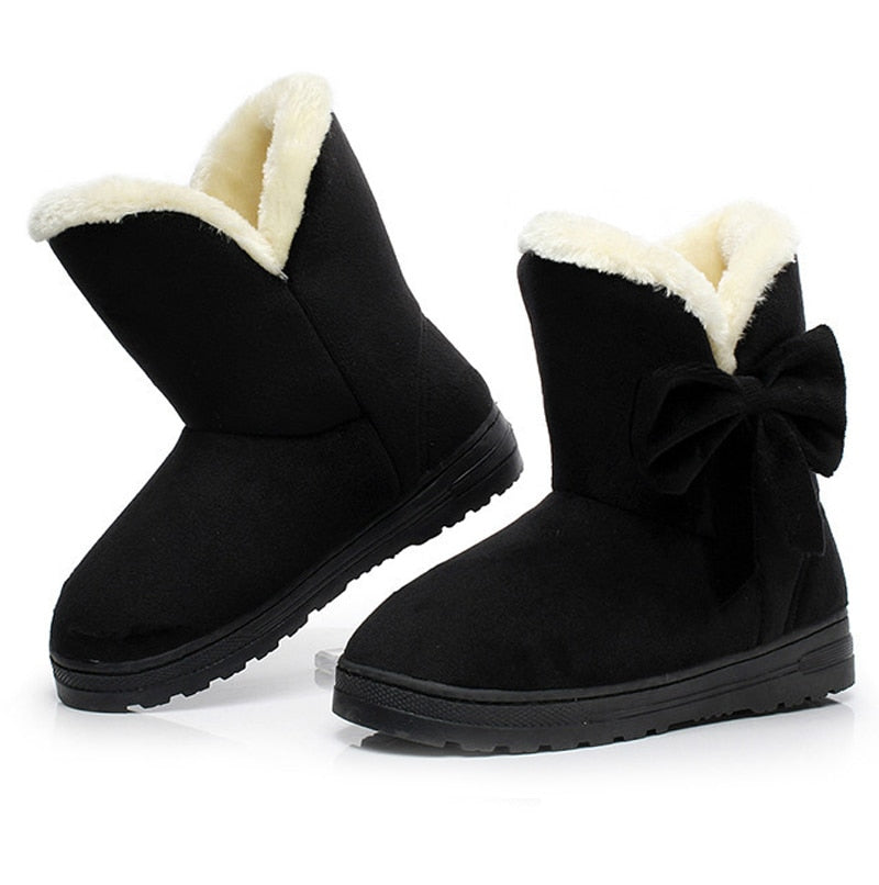 Botas de nieve de ante con lazos 