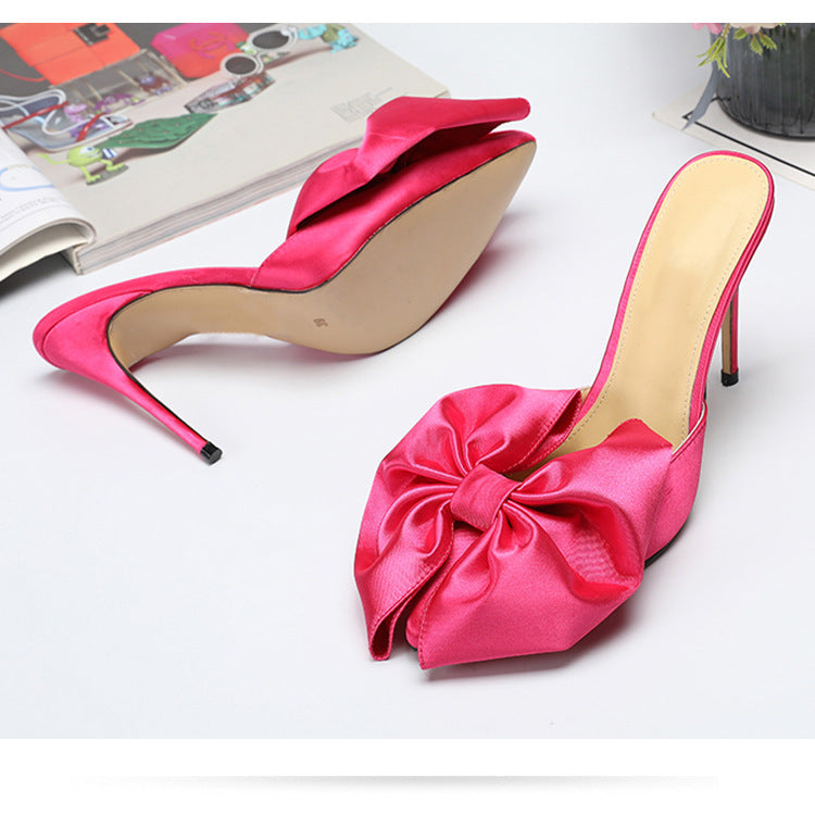 Rosa High Heels mit Schleife