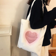 Bolsa de mano con forma de corazón estético