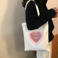 Bolsa de mano con forma de corazón estético