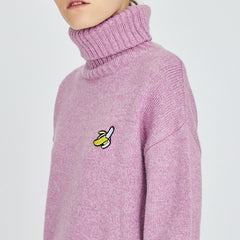 Rollkragenpullover mit Bananenblatt