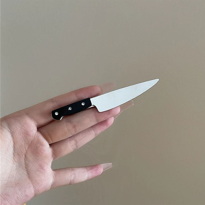 Pinza para el pelo con forma de cuchillo grande