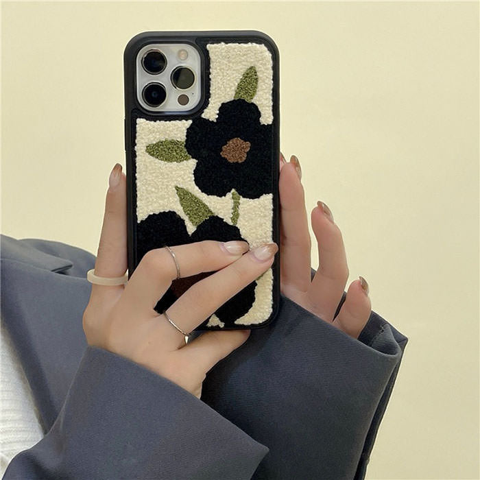 Funda para iPhone con diseño de osito de peluche y flores negras