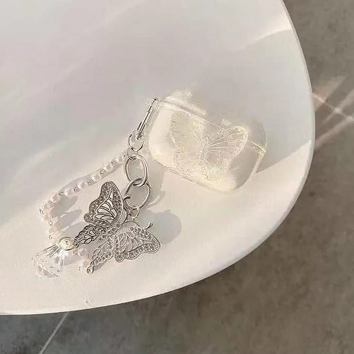 Estuche transparente con diseño de mariposa para Airpods