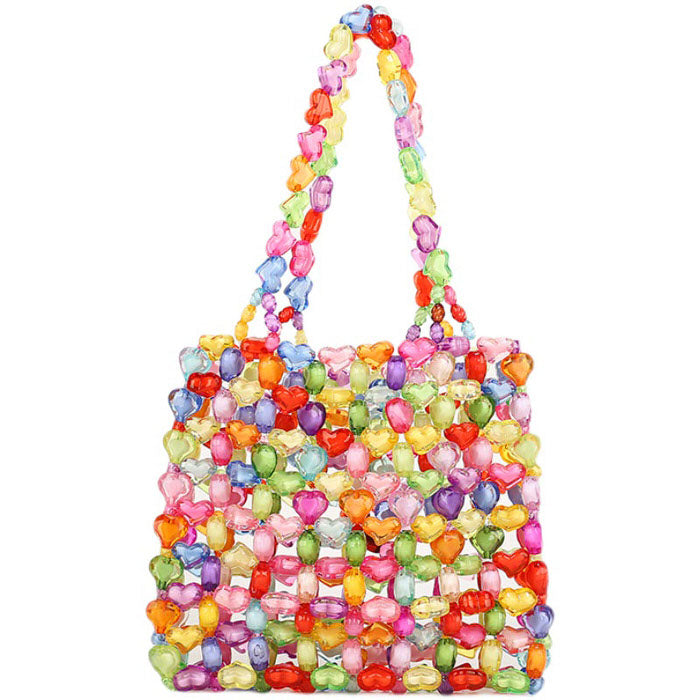 Bolso de mano con cuentas y corazones de caramelo