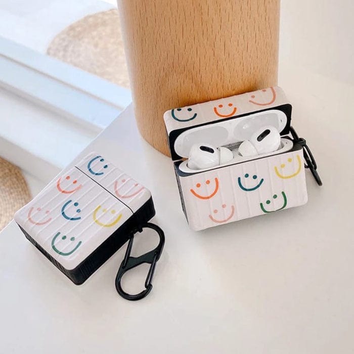 Estuche para AirPods con caras sonrientes de colores