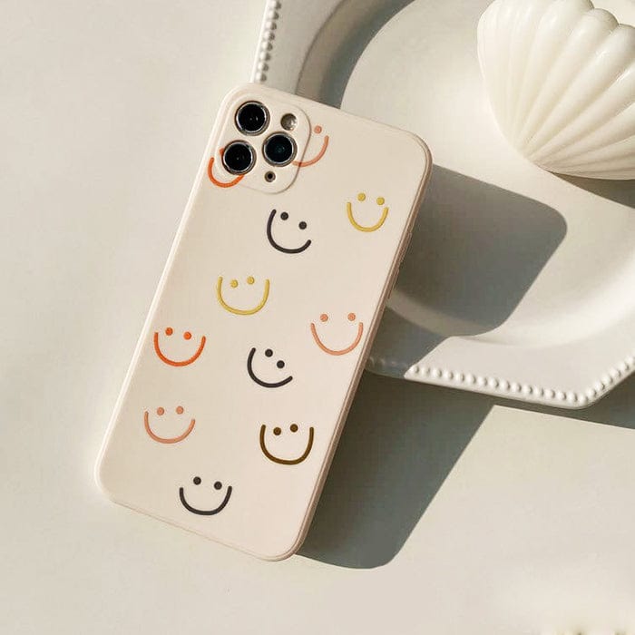 Funda para iPhone con caras sonrientes de colores