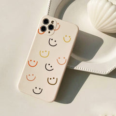 Funda para iPhone con caras sonrientes de colores