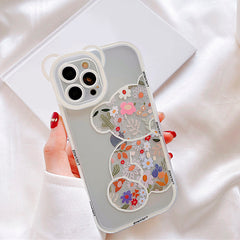 Funda para iPhone con cadena de oso floral