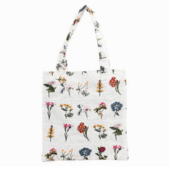 Bolsa de mano con bordado floral