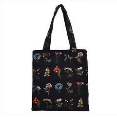 Bolsa de mano con bordado floral