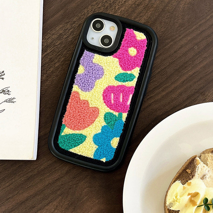 Funda para iPhone con flores bordadas