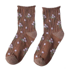 Socken mit Blumenstickerei