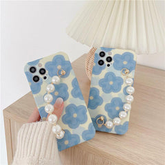 Funda para iPhone con cadena de perlas y flores 