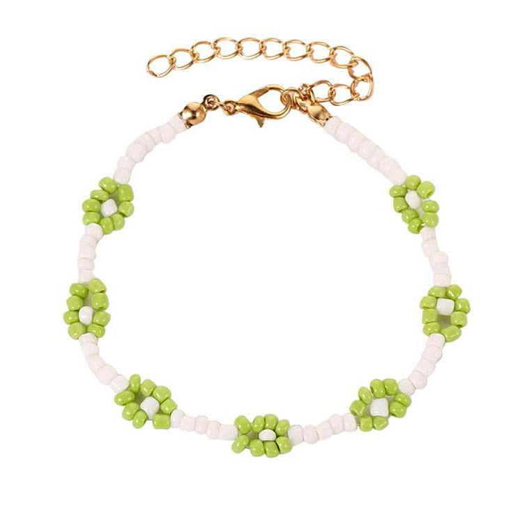 Pulsera de flores "La amistad nunca termina"