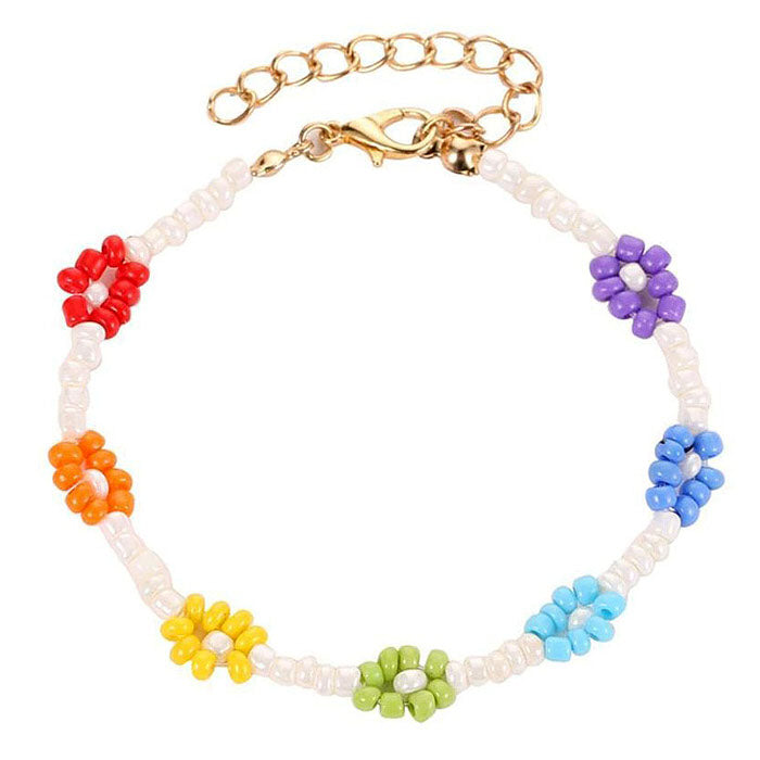 Pulsera de flores "La amistad nunca termina"