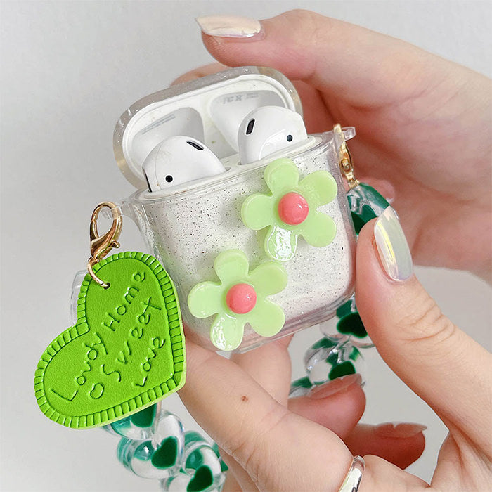 Grünes Gänseblümchen-AirPods-Etui