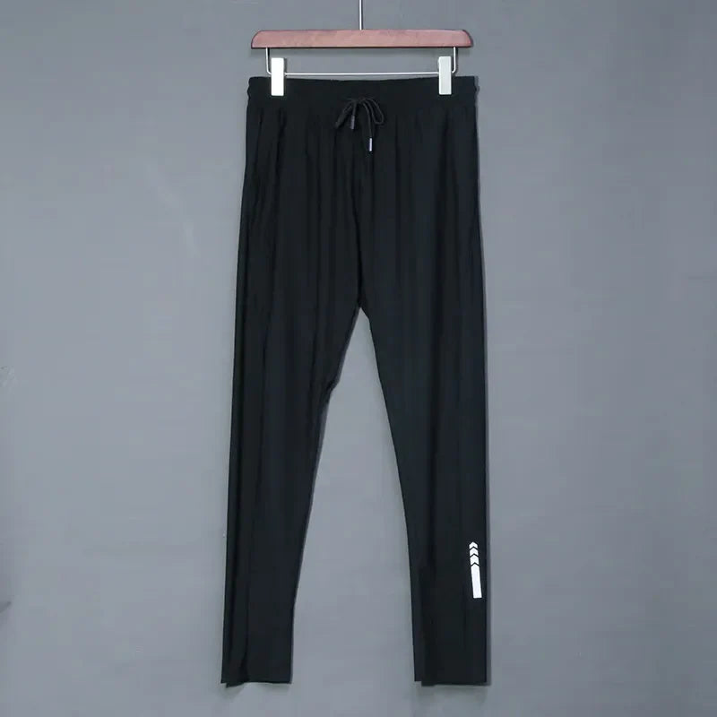 Pantalones deportivos elásticos para correr para hombre, para trotar y entrenar. 