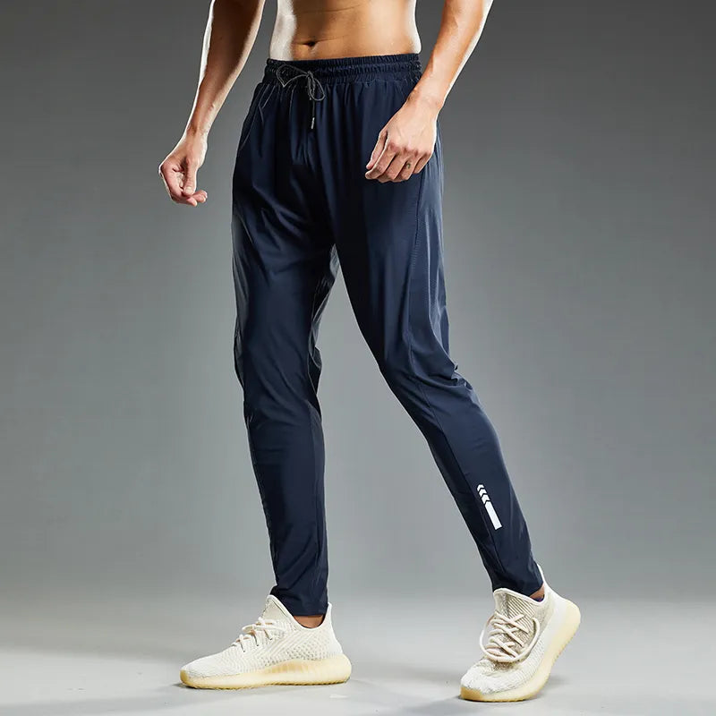 Pantalones deportivos elásticos para correr para hombre, para trotar y entrenar. 