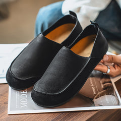 Flat slip-on Birkenstock-style loafers—stylish and casual.
