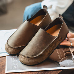 Flat slip-on Birkenstock-style loafers—stylish and casual.