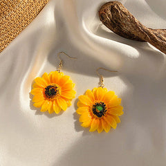 Pendientes de girasoles