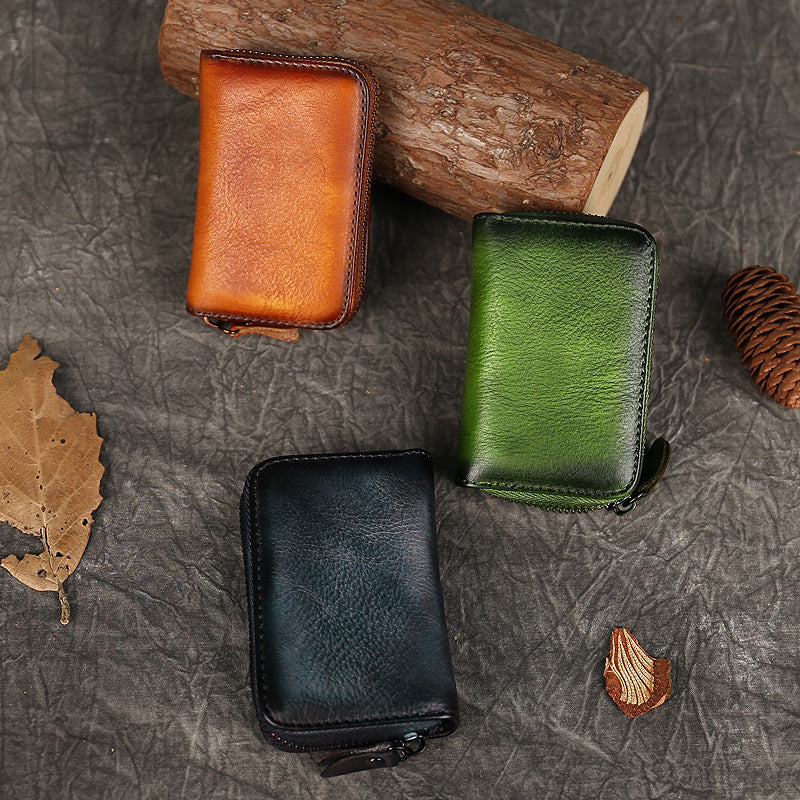 Bonita cartera pequeña de cuero con cremallera