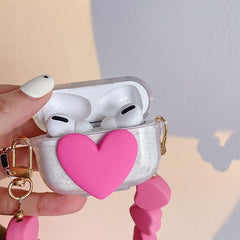 Estuche para AirPods con cadena de corazón rosa 