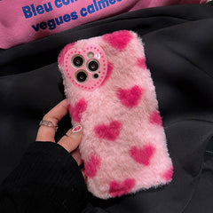 Funda para iPhone con corazón rosa y peludo