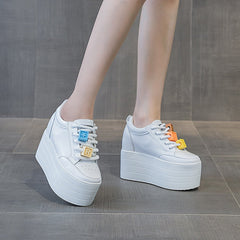 12 cm hohe Keilabsatzschuhe aus Leder für Damen