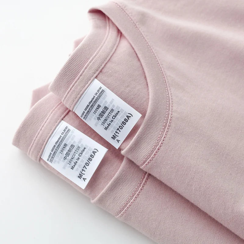 Camisetas de uniforme unisex de algodón peinado liso