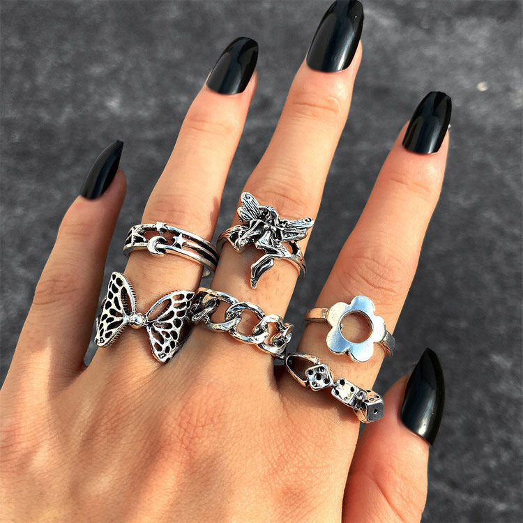 Juego de anillos con estética grunge de hadas