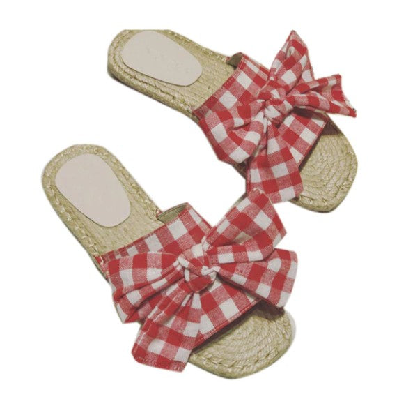 Flache Flip-Flops mit kariertem Webmuster und Schleife 