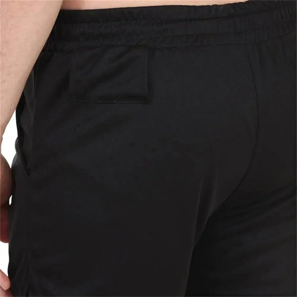 Pantalones cortos de compresión de secado rápido con bolsillos para hombre