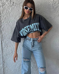 Camiseta holgada con estampado vintage y lavado ácido para mujer