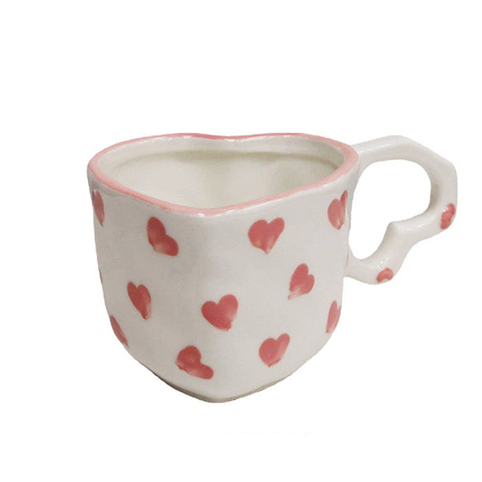 Taza de cerámica con forma de corazón