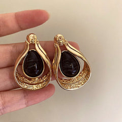 Pendientes vintage de piedra negra con estética