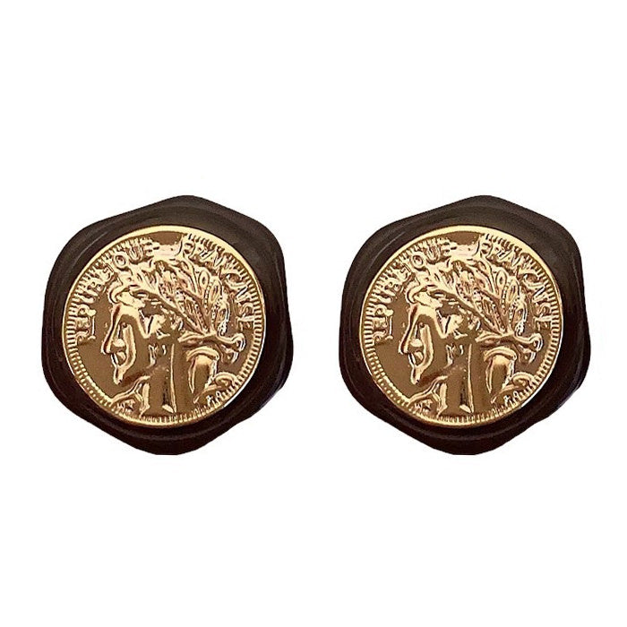 Pendientes de monedas con estética vintage